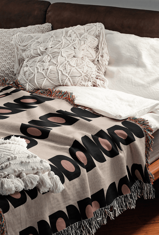 Blush and Charcoal Geometric Woven Throw Blanket