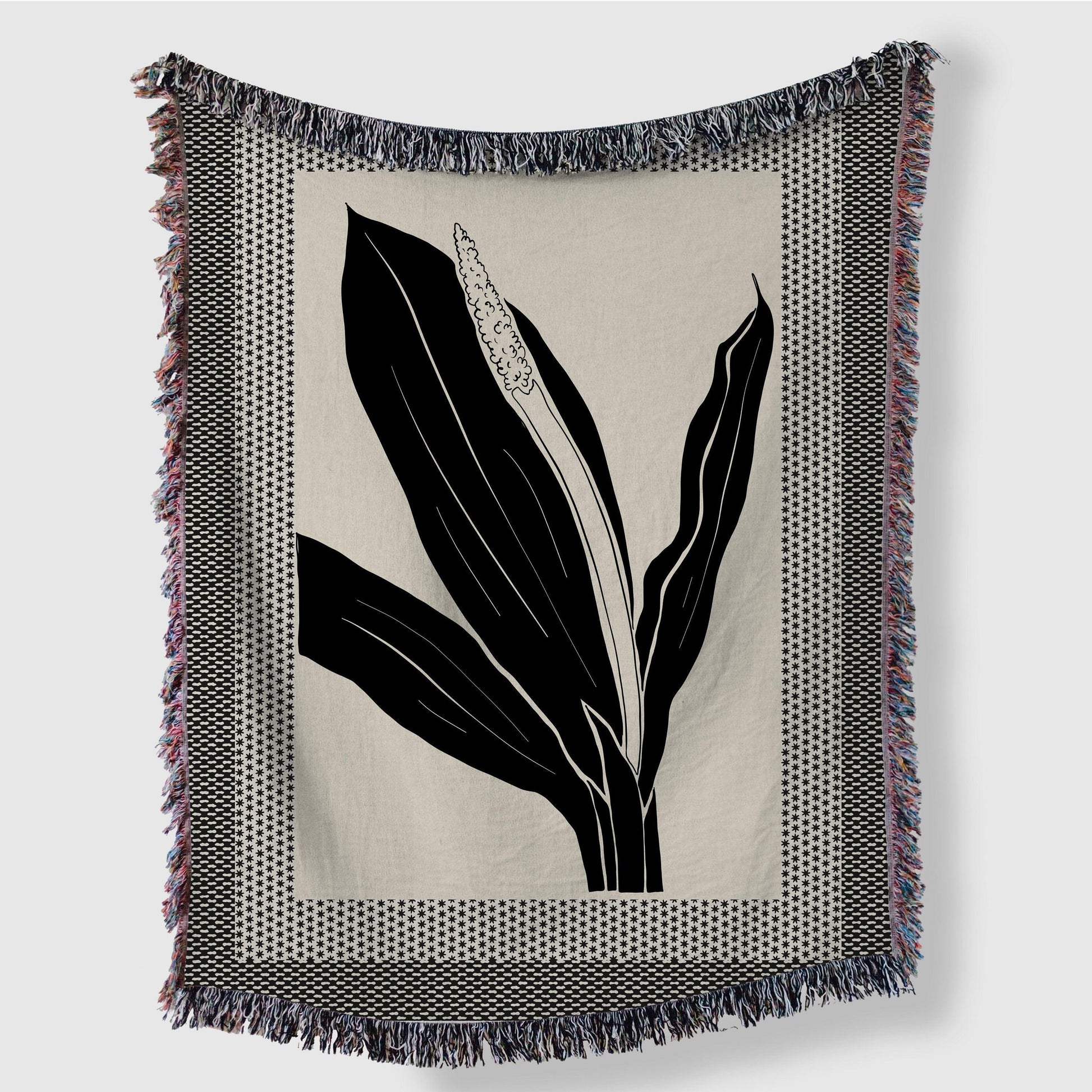 Framed Minimalist Black And Beige Floral Woven Blankets