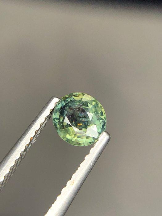 Unheated Blue-Green Sapphire Oval Gemstone | Teal Parti Sapphire (0.80 Ct)