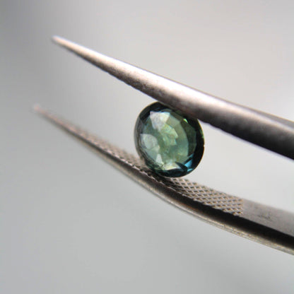 Unheated Blue-Green Sapphire Oval Gemstone | Teal Parti Sapphire (0.80 Ct)