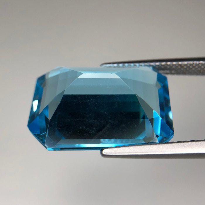 Natural Blue Topaz Gemstone | Emerald Cut 24.91 Ct Certified Loose Stone