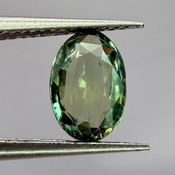Natural Green Sapphire Oval Gemstone | Unheated Teal Corundum (1.03 Ct, IGI Certified)