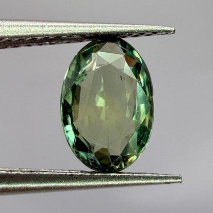 Natural Green Sapphire Oval Gemstone | Unheated Teal Corundum (1.03 Ct, IGI Certified)
