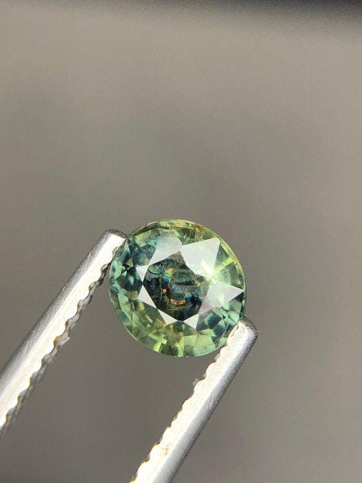 Unheated Blue-Green Sapphire Oval Gemstone | Teal Parti Sapphire (0.80 Ct)