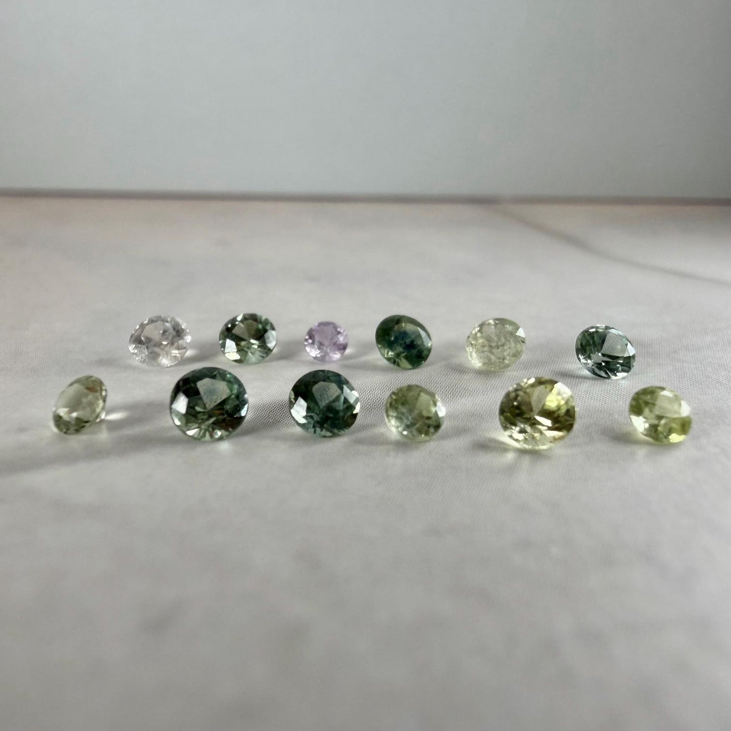 1.70 TCW Montana Sapphire Parcel – 12 Faceted Natural Sapphires – Teal Green Yellow Lavender