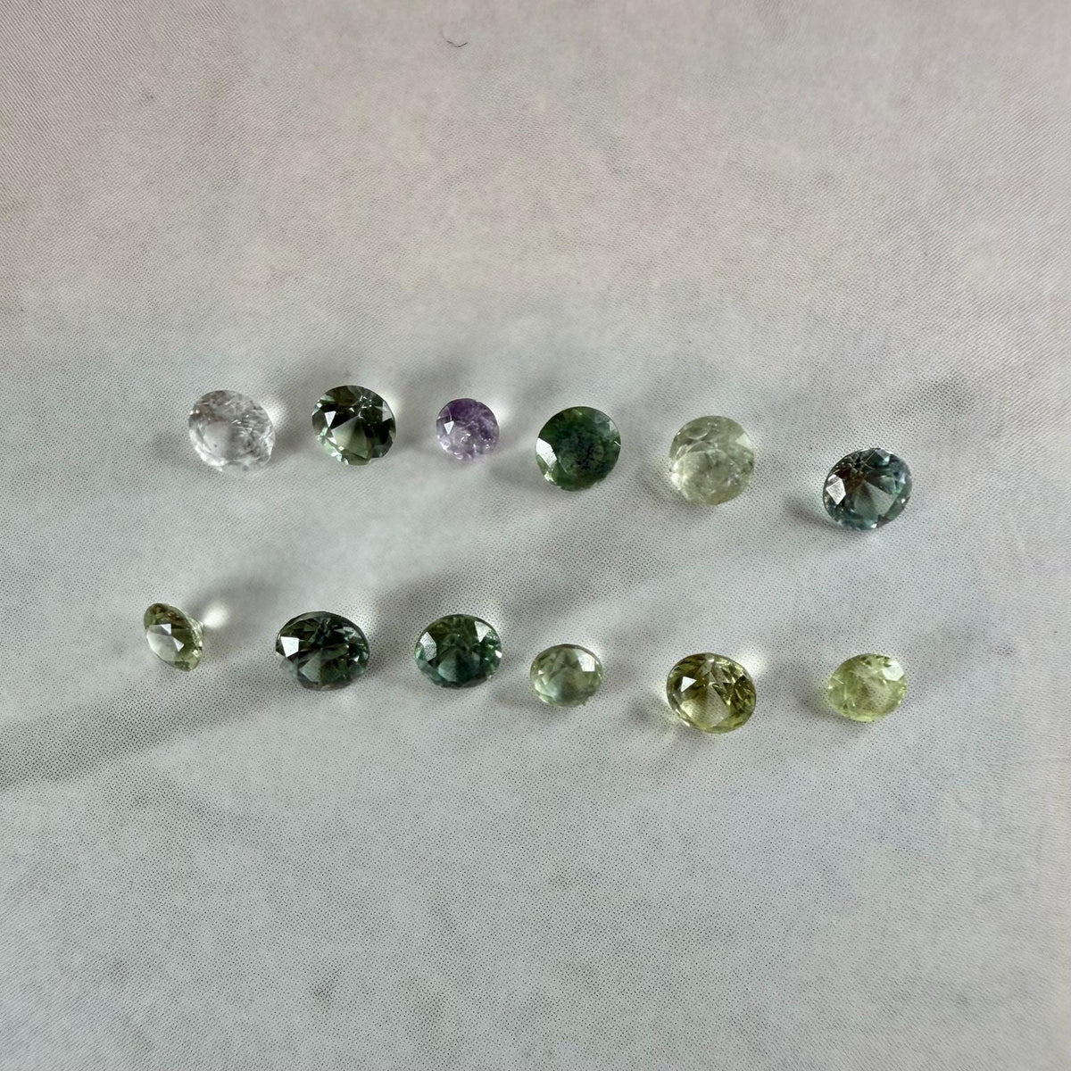 1.70 TCW Montana Sapphire Parcel – 12 Faceted Natural Sapphires – Teal Green Yellow Lavender
